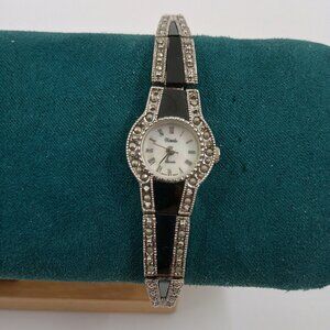 Vintage Xanadu Marcasite Silver Black Tone Bracelet Watch with MOP Dial.